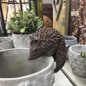 Above: A Parlane hedgehog pot hanger.