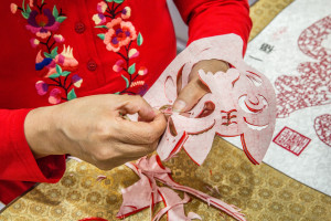 Above: A Chinese manufacturer demonstrates her skill at intricate handicraft work at last year’s show. 
