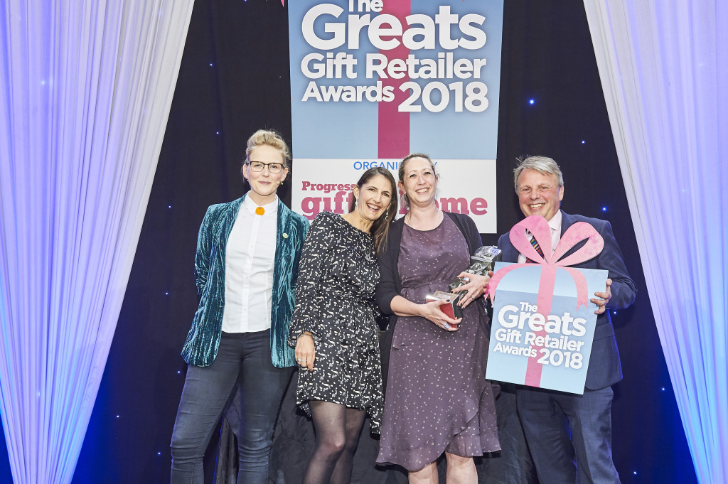 Above: Oliver Bonas’ Ecommerce strategist Camilla Tress (left), together with customer service manager Sarah Davies,were presented with The Greats trophy as winner of the Best Specialist Multiple Retailer of Gifts by Lincoln Exley, managing director of Allsorted, category sponsor.