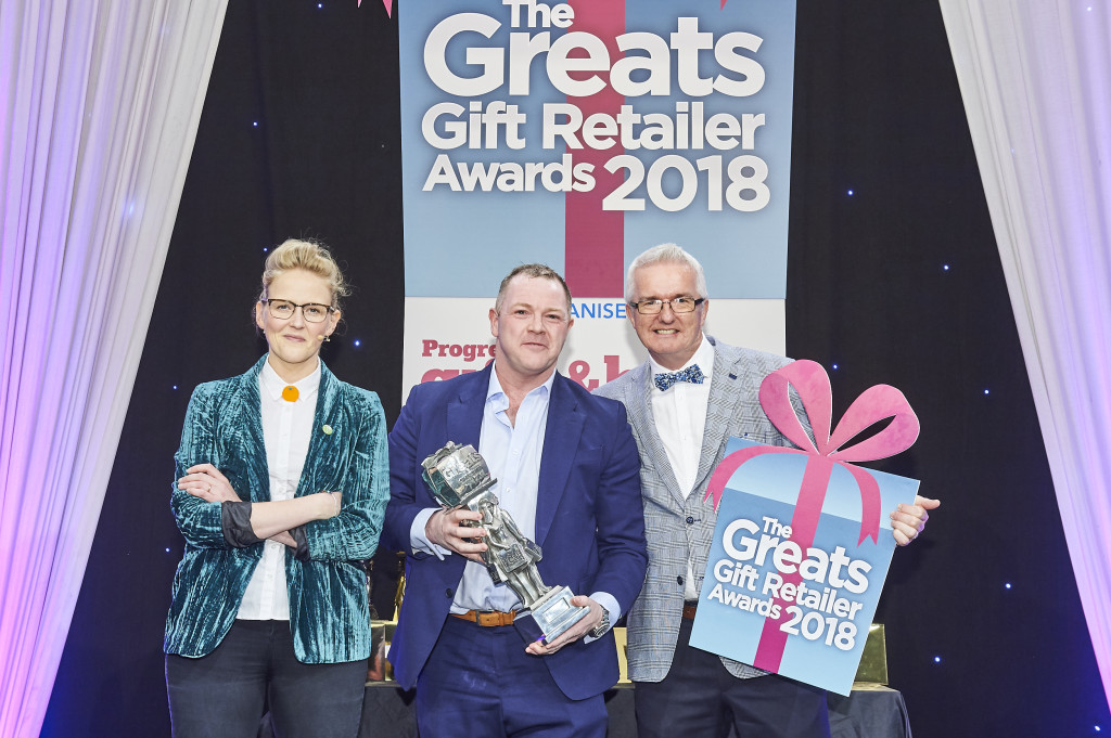 Above: David Robertson’s shop Pozzi in Buckie was the winner of The Greats 2018 Best Gift Retailer of Jewellery & Fashion Accessories award. David (centre) is shown with category sponsor Peter O’Loughlin, director of P&A Agencies, representing Dansk Smykkekunst, and compere Pippa Evans.