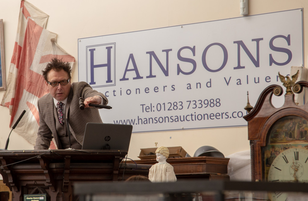 Above: Going, going, gone! A fierce phone bidding war took place at Hansons Auctioneers in Derbyshire yesterday.
