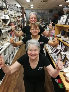 cofAbove: Thumbs up from Jo Williams (back row),shop supervisor Debbie Carey (centre) and Linda Tandy, shop manager, on receiving two Greats nominations last Thursday.