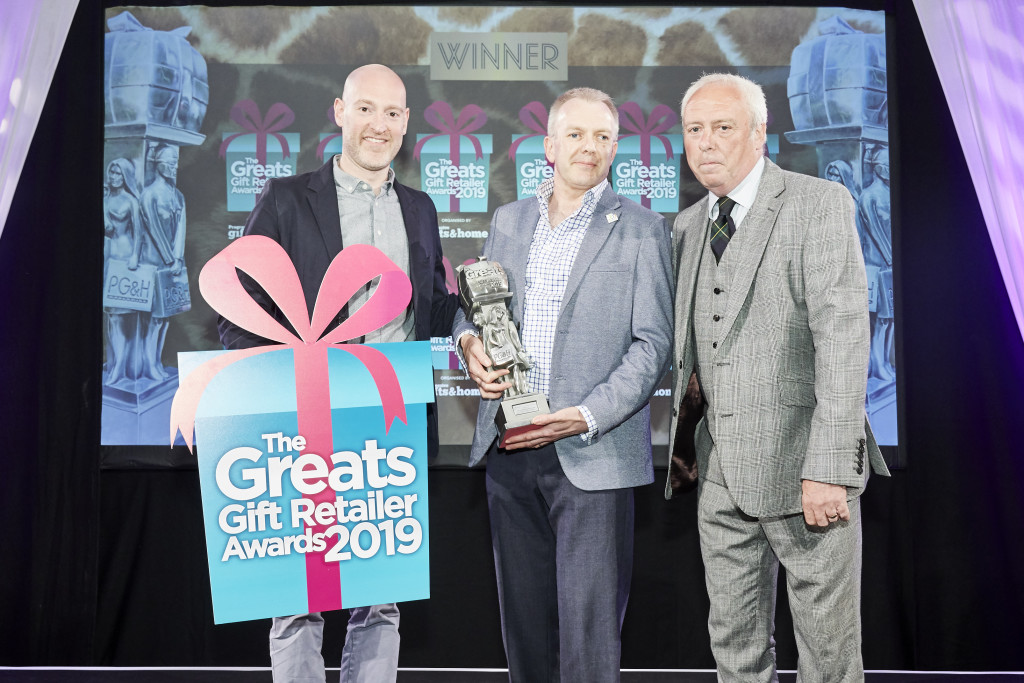 Above: Mark Alexander, retail manager of the National Memorial Arboretum, was presented with the Best Museums or Visitor Attractopm Gift Shop trophy Greats trophy by Peter Goodman of Heritage Art and Design, sponsors of the category.