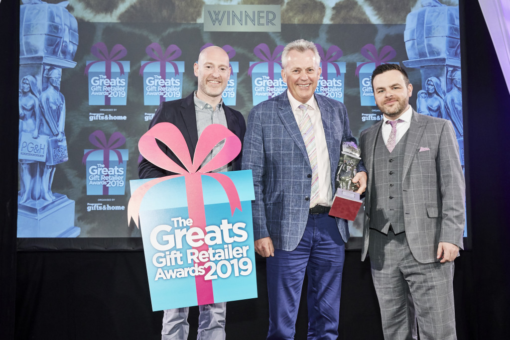 Above: Andrew Illingworth, sales director of Widdop and Co., (centre), received The Greats silver award for the Best Service to the Independent Retailer from Rob Willis, director and co-owner of category sponsor GiftsandHome.net (right).