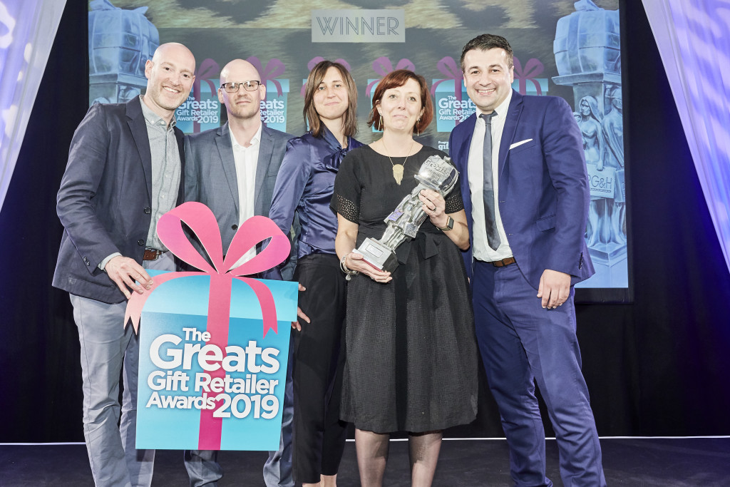 Above:  Sam Wahid, MD of Gift Republic, category sponsor, recently presented Oliver Bonas’ James Parish, Dovile Jurcicaite and Natalia Earney, with The Greats 2019 trophy for Best Online or Mail Order Gift Retailer.