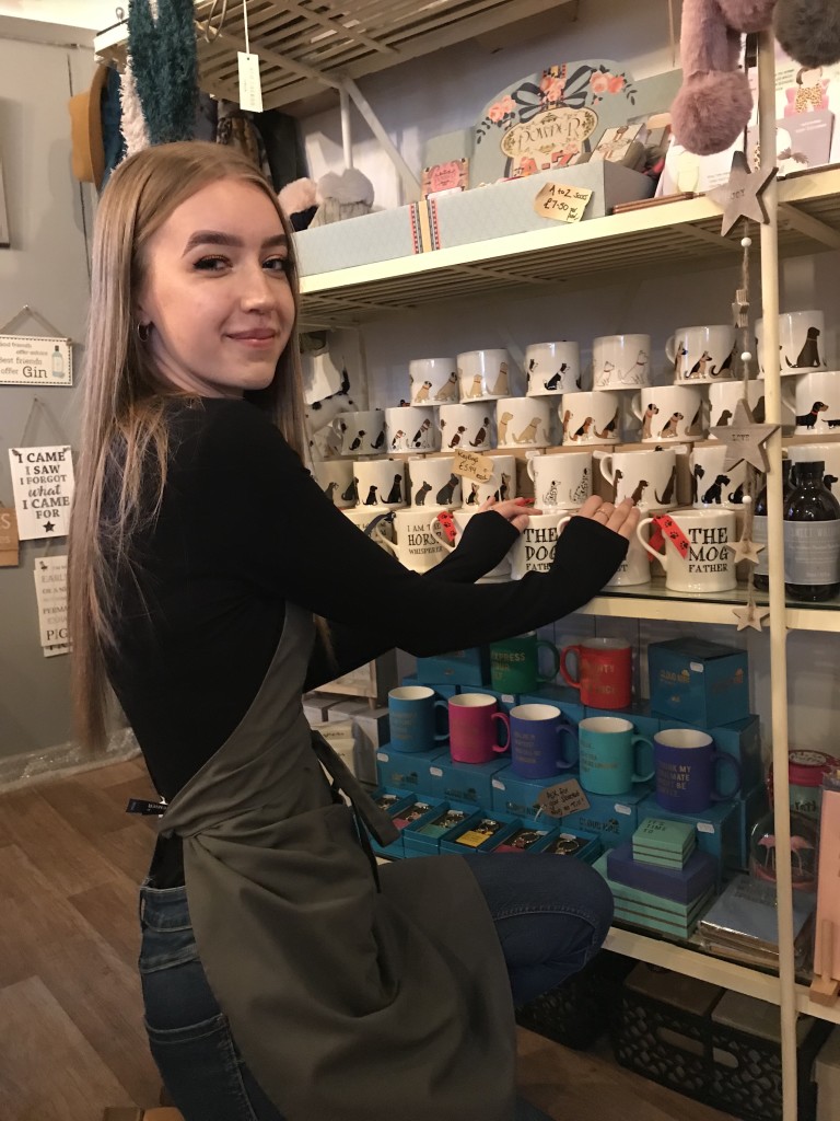 Above: Saturday girl Erin Brown is shown merchandising the products.