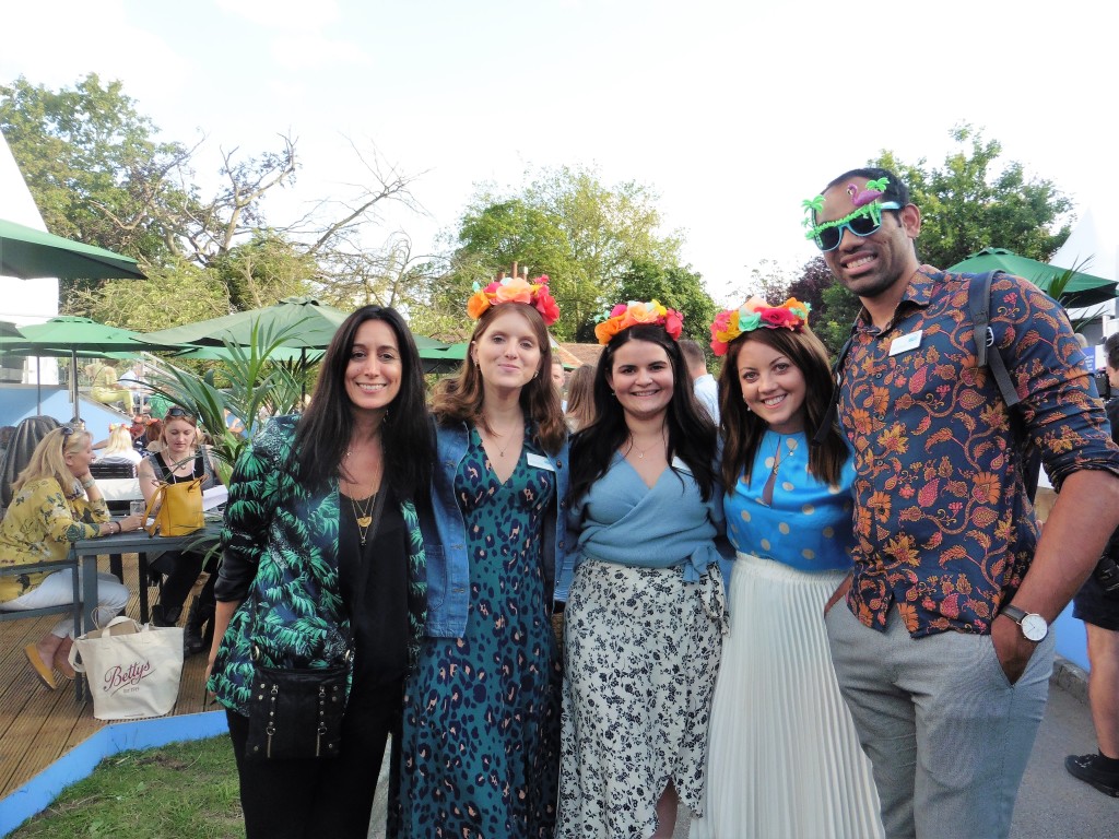 Above: In the mood to party, Clarion show director Alejandra Campos (left) with the Clarion team last July.