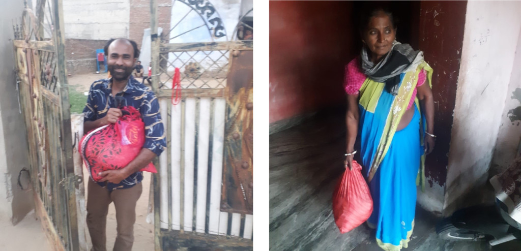 Above: Migrant workers are shown with the food bags that are helping to save them from starvation.