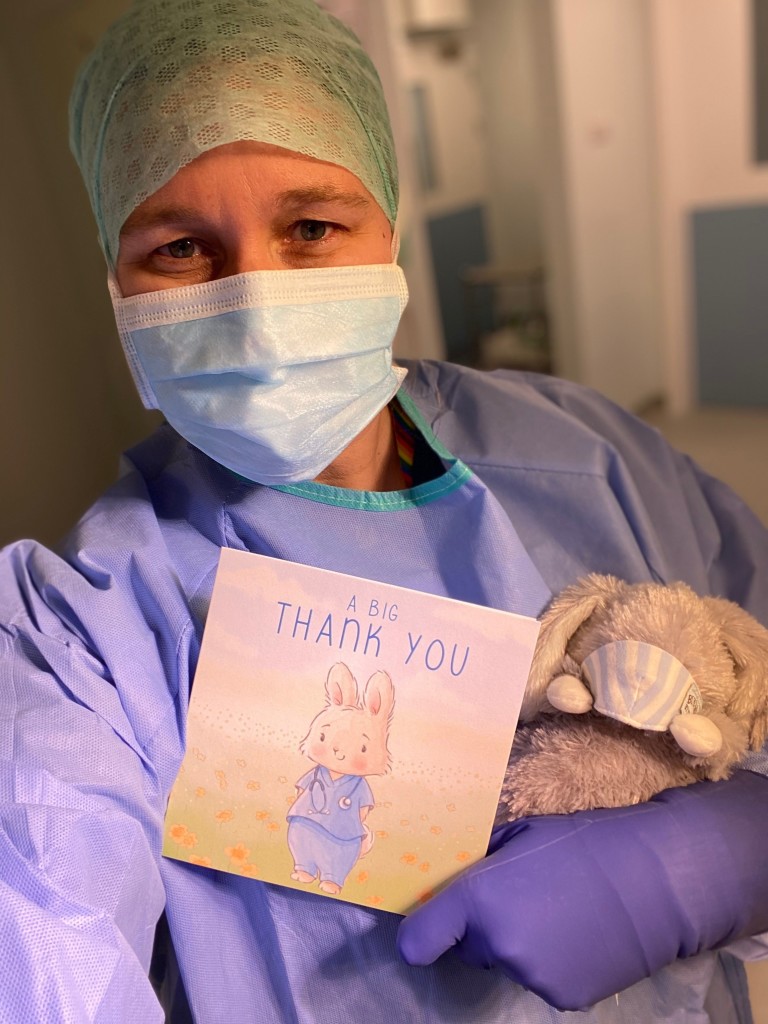 Above: Carol, a theatre nurse at the Countess of Chester Hospital, and now on the Covid-19 ward, is shown with the mask-wearing bunny.