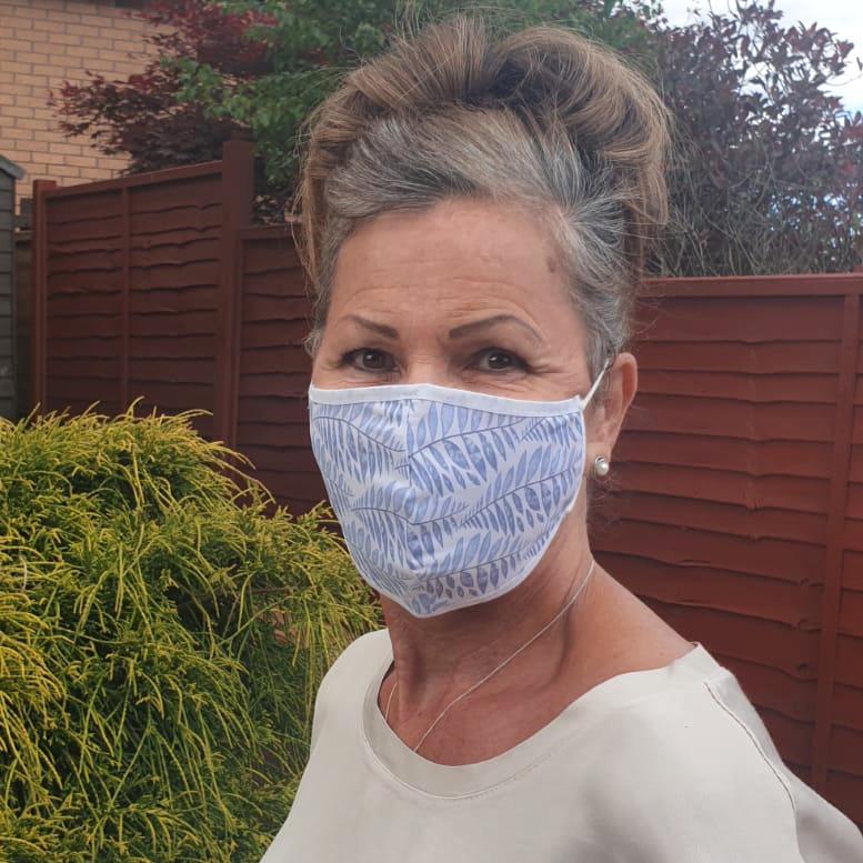 Above: A Miss Shorthair fabric face mask.