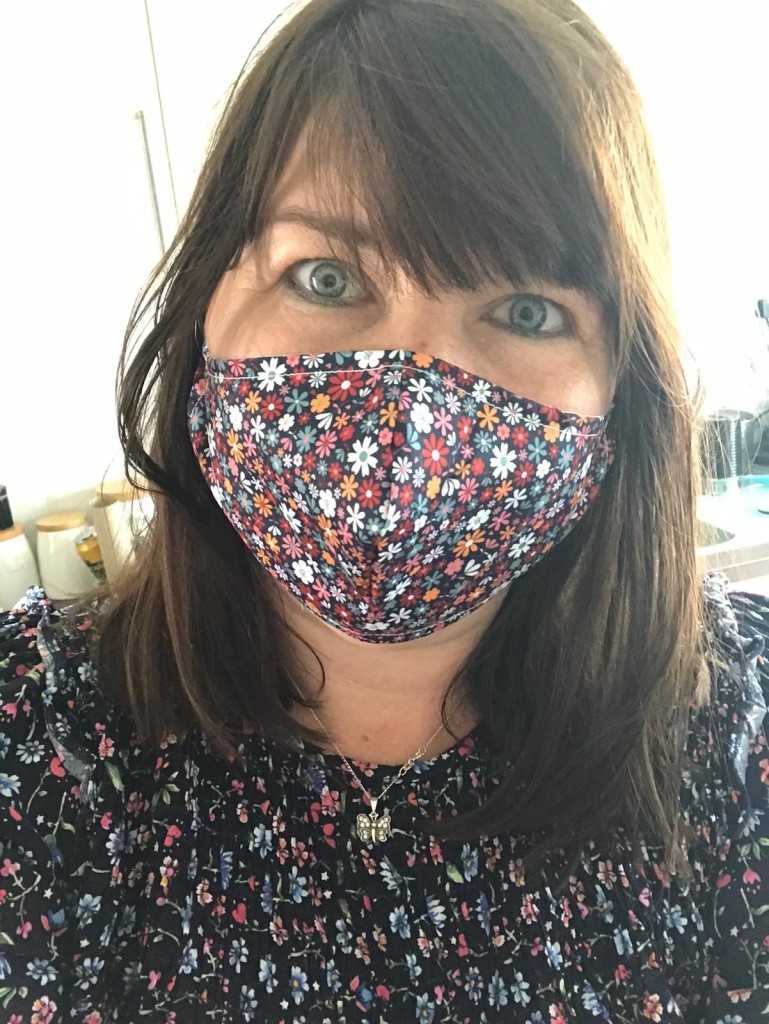 Above: A customer at The Present in Barnet wears an Eco Chic face mask that matches her outfit.