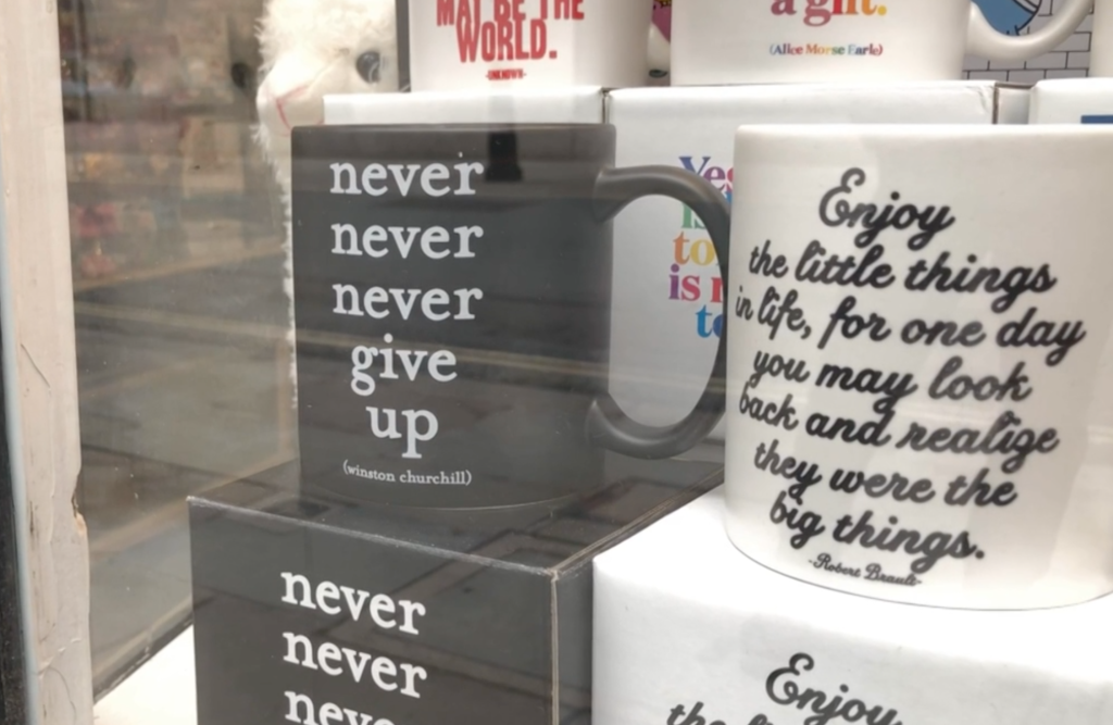 Above: The BBC film ends on a mug in a Cards Galore window which offers hope by way of a Winston Churchill quote.