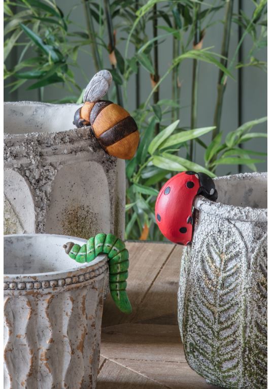 Above: New from Gallery Direct are bee and caterpillar pot hangers.