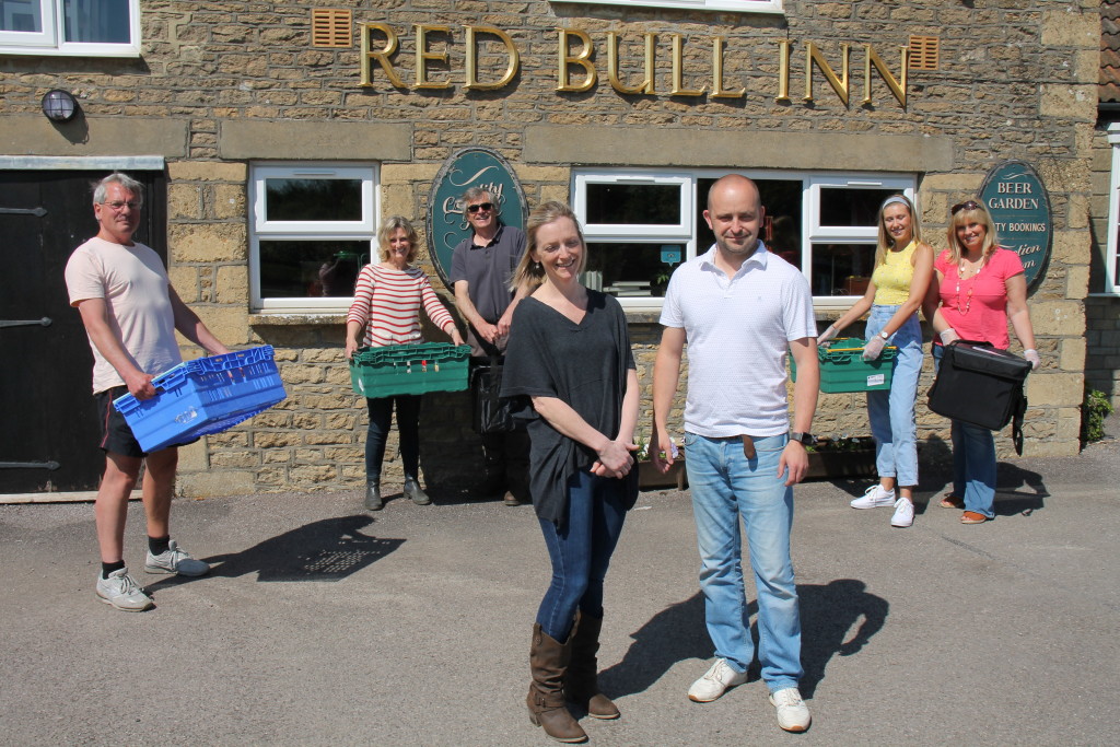 Above: Volunteers from Heals of Malmesbury, organised hot food deliveries with the assistance of The Red Bull Pub. (Photo courtesy of Liz Cooke).