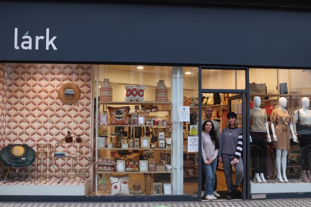 Above: The new Lark shop window at Balham, South London. Shown are, from left to right: owners Priya and Dominic Crowe, and social media director Heloise Byfield.