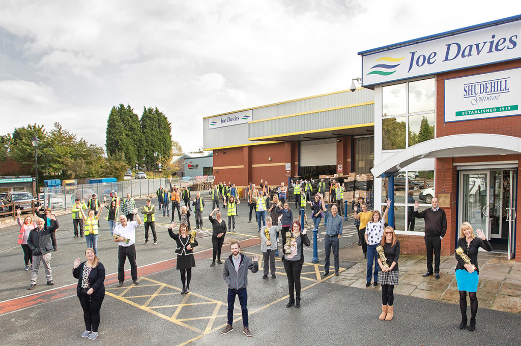 Above: The Joe Davies team are shown outside the company’s Shudehill premises.