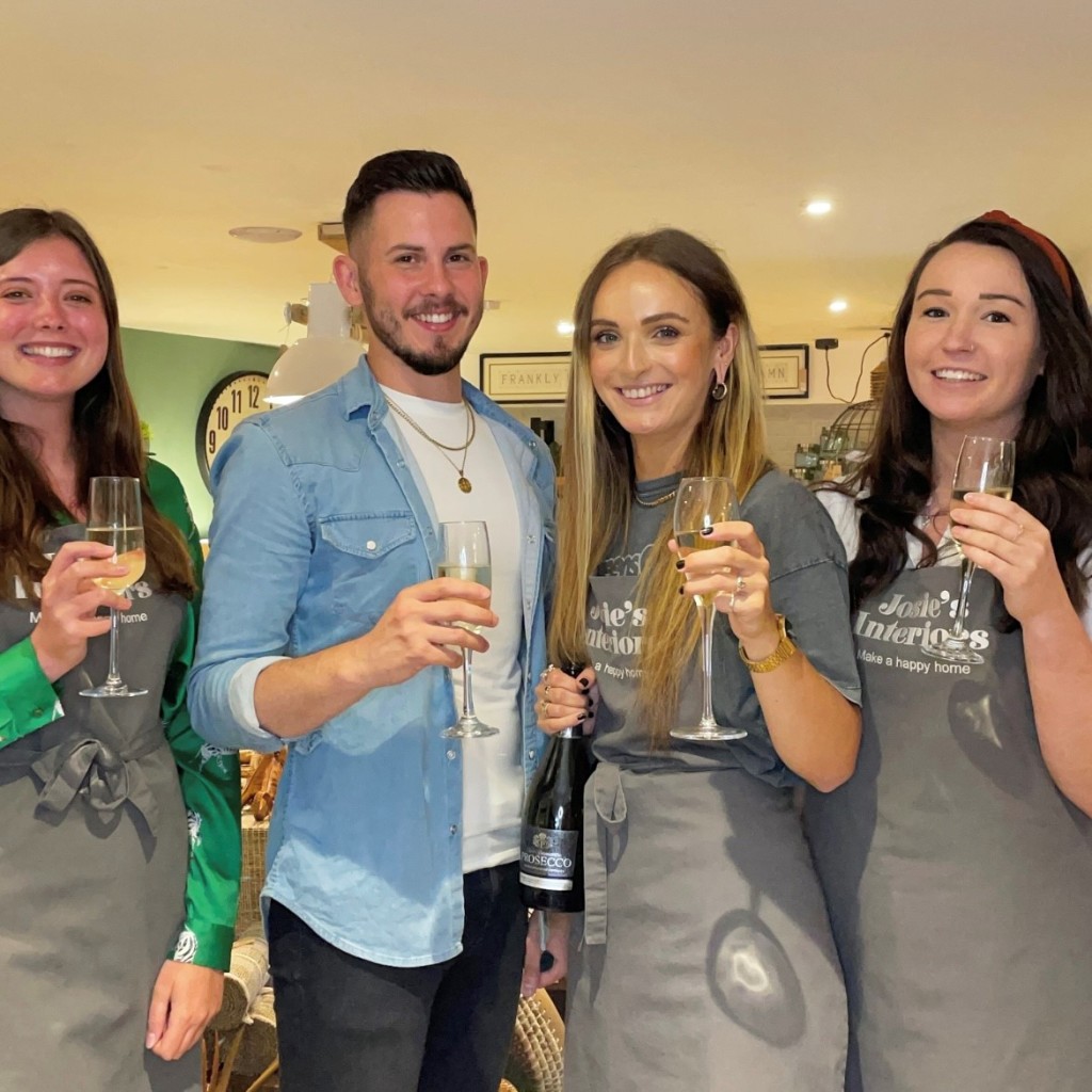 Above: James Webster and his team clink glasses at Josie’s Interiors in Bideford.