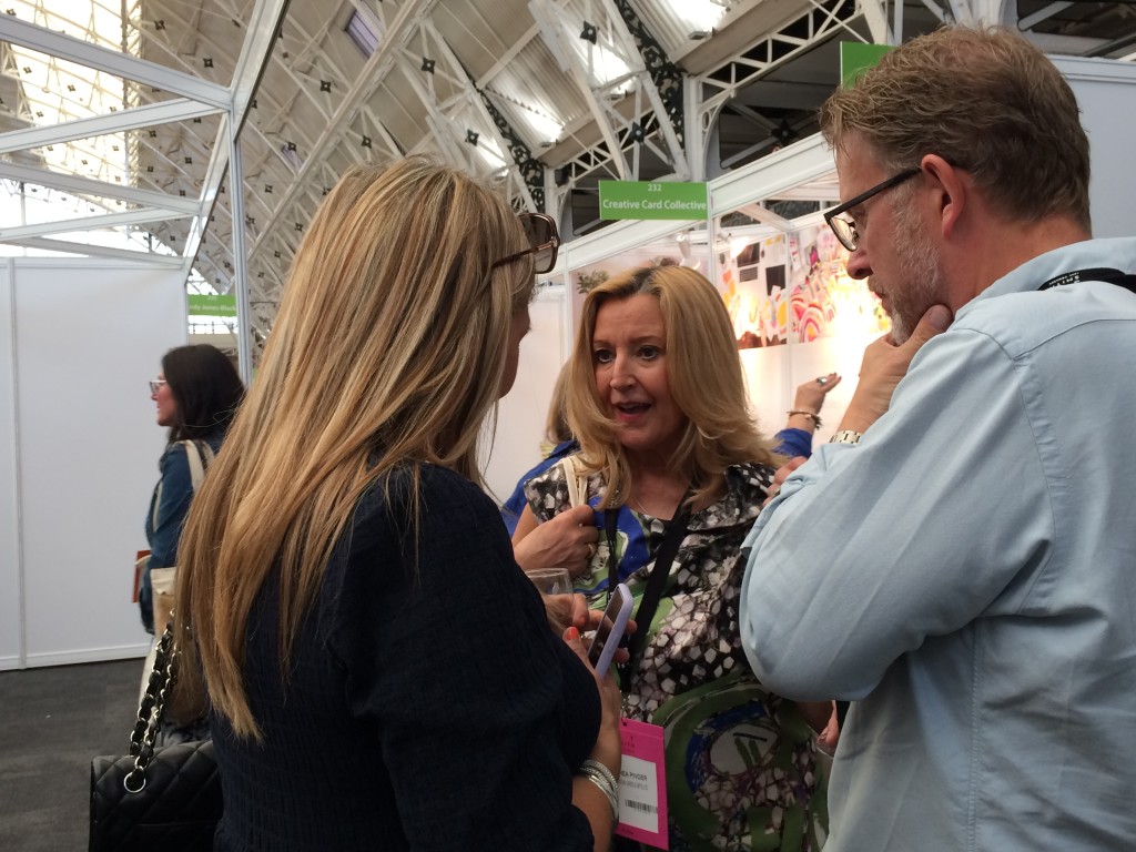 Above: Presentation’s owner Andrea Pinder enjoying a chat with fellow gift and greeting card retailers.