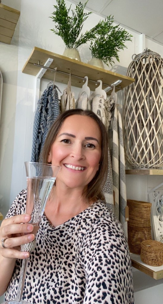 Above: What better excuse for opening some bubbly! Jane Peakall, co-owner of Daisy Lanes in Rayleigh, celebrates the news.