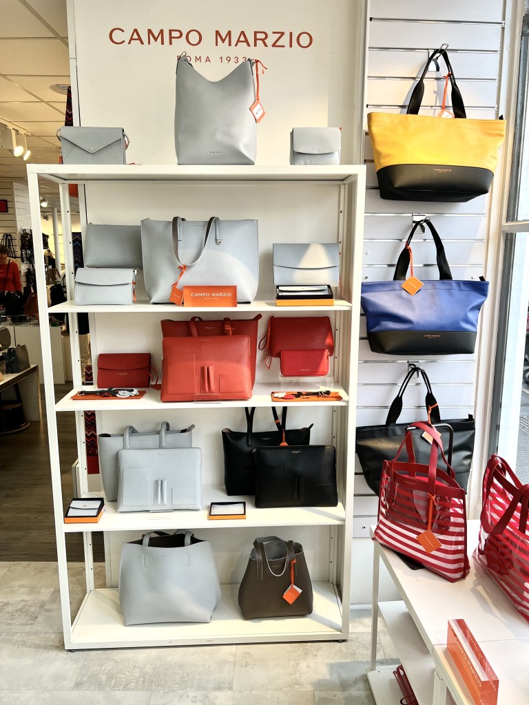 Above: A display of colourful Campo Marzio bags on display at Elphicks in Farnham.