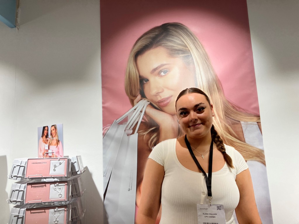 Above: Elana Coulson on the Life Charms stand.