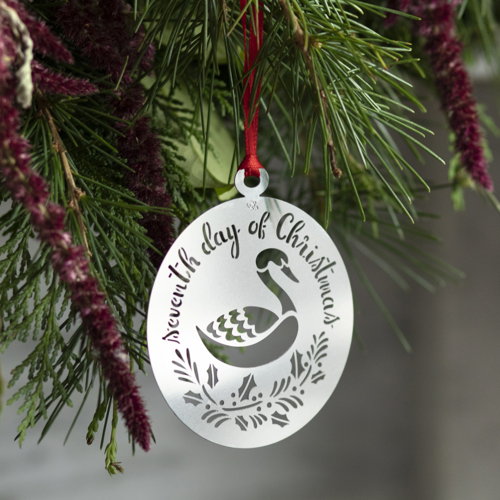 Above: The Robert Welch Christmas decoration for day 7 reflects seven swans a-swimming.
