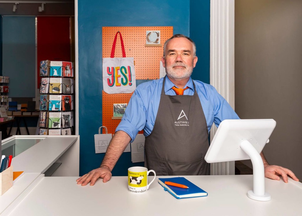 Top: Sean Austin, owner of Austin & Co in Malvern, is shown in his very dog-friendly store.