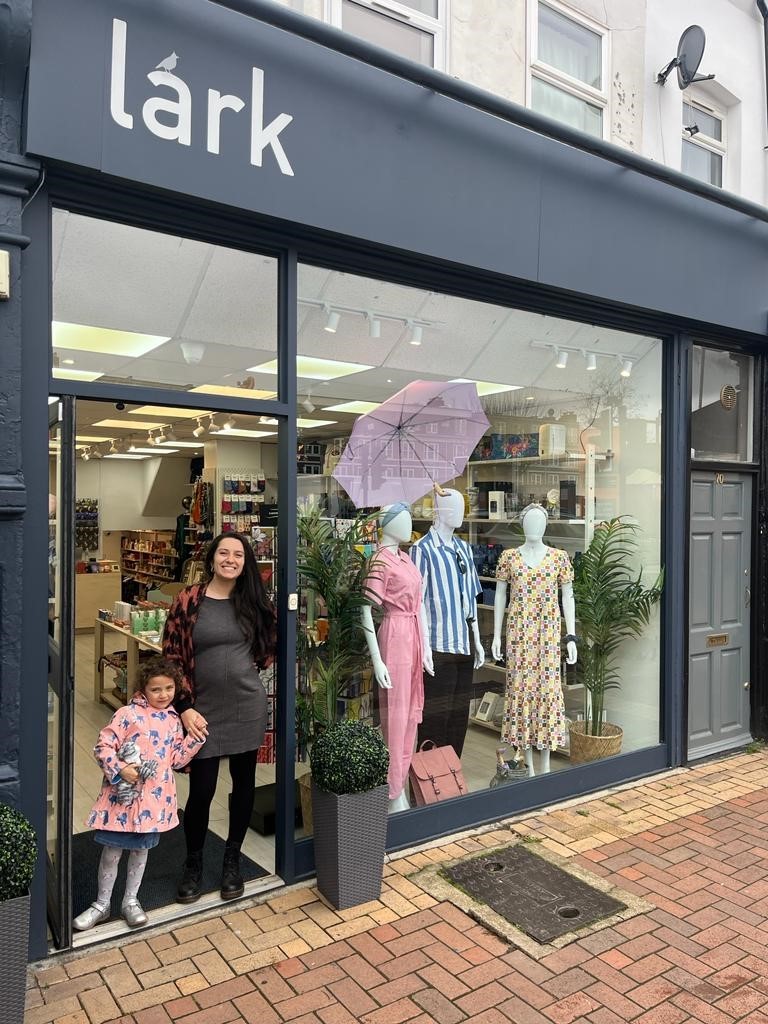 Above: Lark’s co-owner Priya Aurora-Crowe is shown outside the Putney store with her daughter.