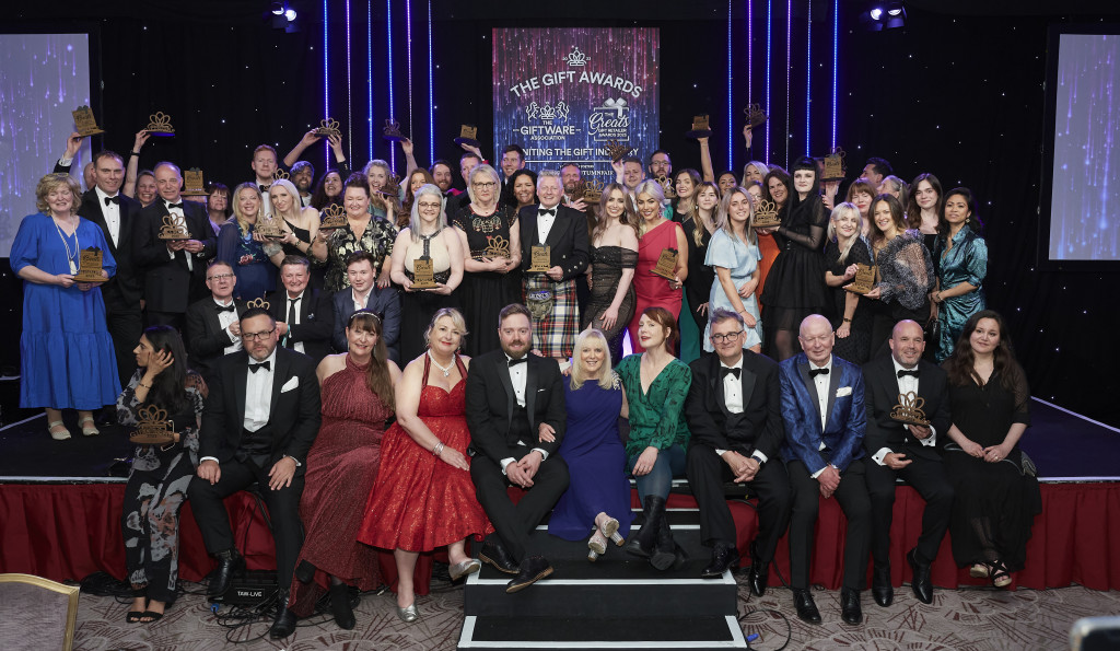 Above: We’ve won! Big smiles from the delighted winners of both The Greats Awards and The Gift of the Year Awards who are shown on stage with their trophies at London’s Royal Lancaster Hotel.