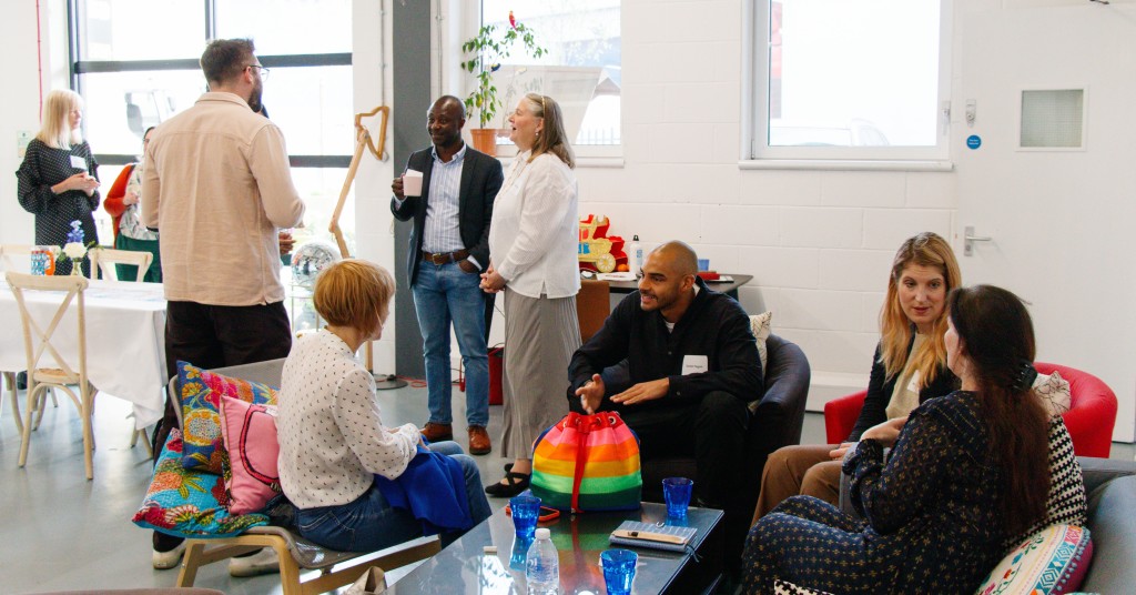 Above: Talking Tables’ founder and managing director Clare Harris, (centre, standing) is shown with delegates.