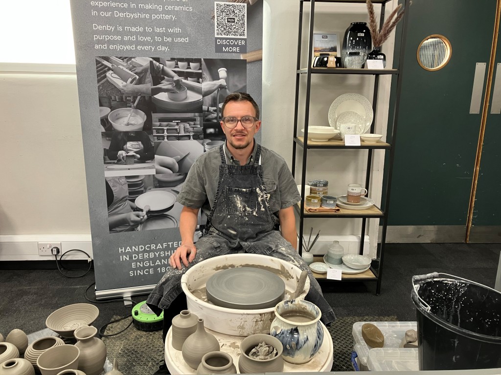 Above: Denby’s master potter Sean Flint is shown demonstrating his craft at the show yesterday