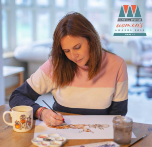 Above: Hannah Dale at work in her studio.