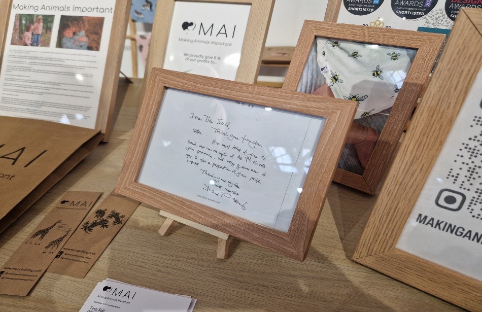Above: A signed letter from Sir David Attenborough took pride of place on Tina Salt's MAI Clothing stand.