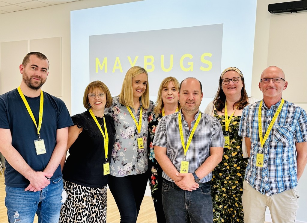 Above: Co-owners Greg Rose (centre) and John Dale (right) are shown with team Maybugs.