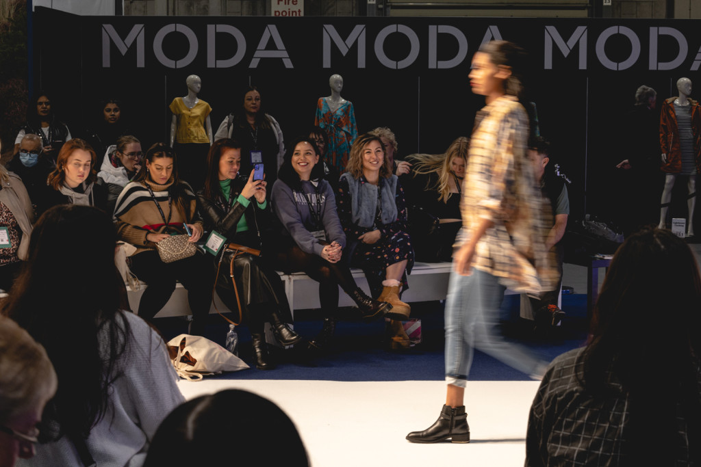 Above: Visitors are invited to take a front row seat at the daily Moda fashion shows.