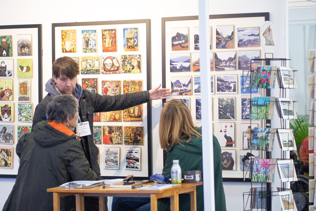 Above: Talking business at last year’s show.