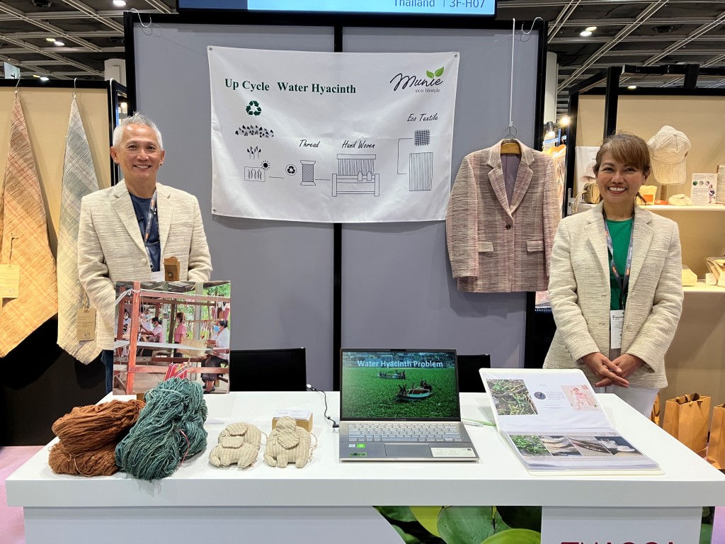 Above: Vilasine Churat, (right), founder and ceo of Munie, is shown with her husband at NEXT@Fashion InStyle at Fashion InStyle.